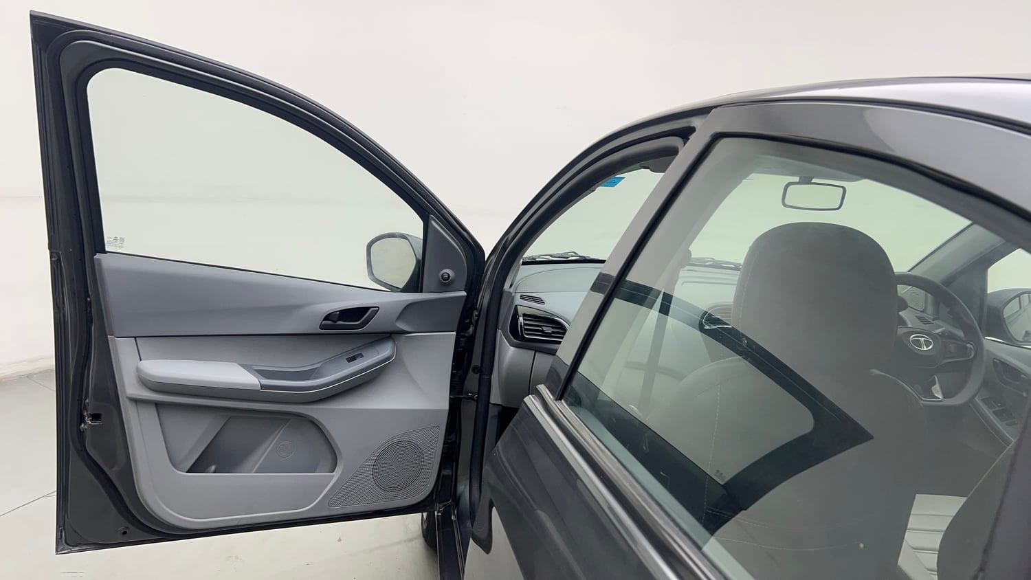 Used 2024 Tata Tigor XM iCNG Cng Manual interior LEFT FRONT DOOR OPEN VIEW
