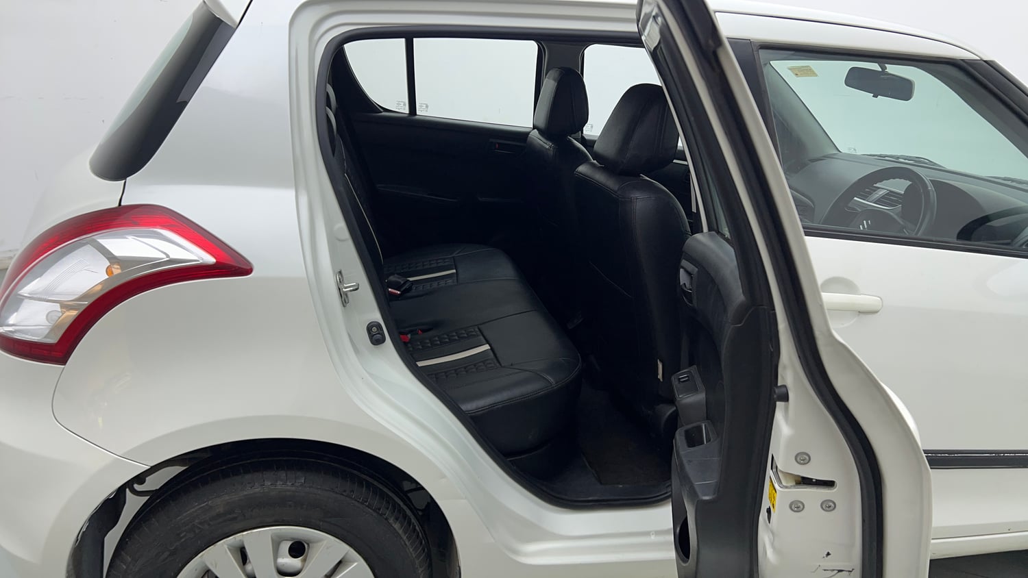 Used 2017 Maruti Suzuki Swift Lxi (O) Petrol Manual interior RIGHT SIDE REAR DOOR CABIN VIEW