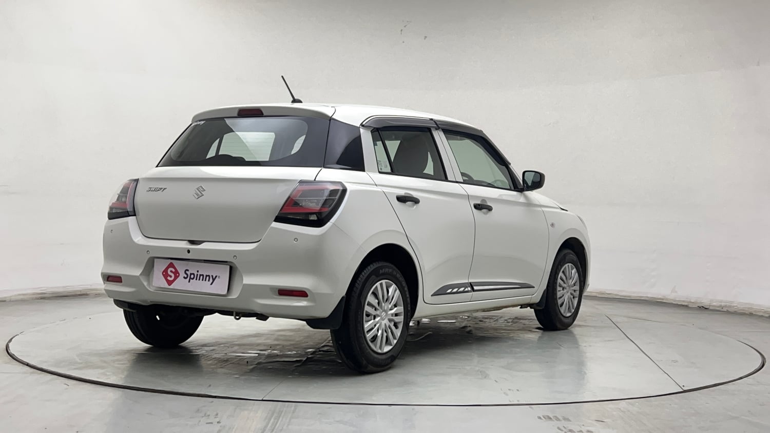 Used 2026 Maruti Suzuki Swift LXi Petrol Manual exterior RIGHT REAR CORNER VIEW
