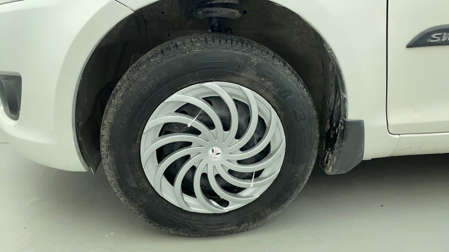 Used 2014 Maruti Suzuki Swift VXI CNG (Outside Fitted) Cng Manual tyres LEFT FRONT TYRE RIM VIEW