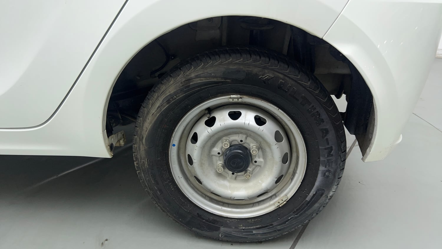 Used 2025 Tata Tiago XE Petrol Manual tyres LEFT REAR TYRE RIM VIEW