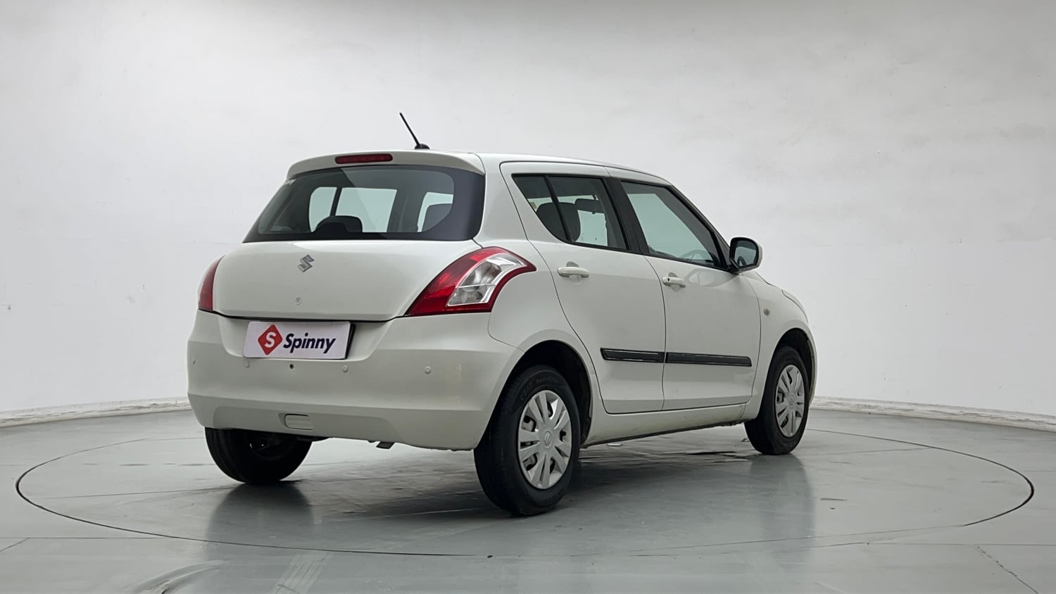 Used 2017 Maruti Suzuki Swift Lxi (O) Petrol Manual exterior RIGHT REAR CORNER VIEW