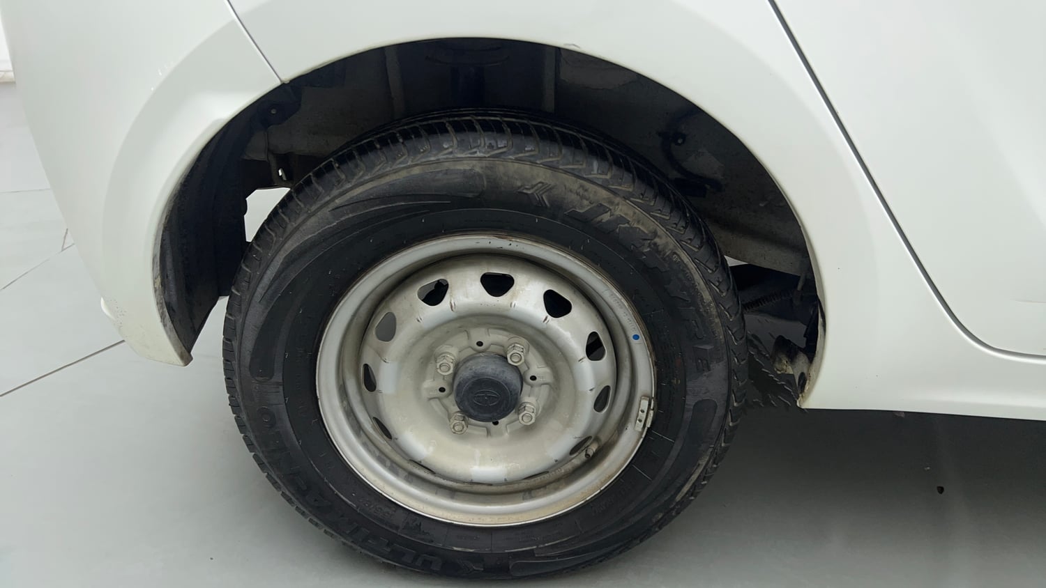Used 2025 Tata Tiago XE Petrol Manual tyres RIGHT REAR TYRE RIM VIEW