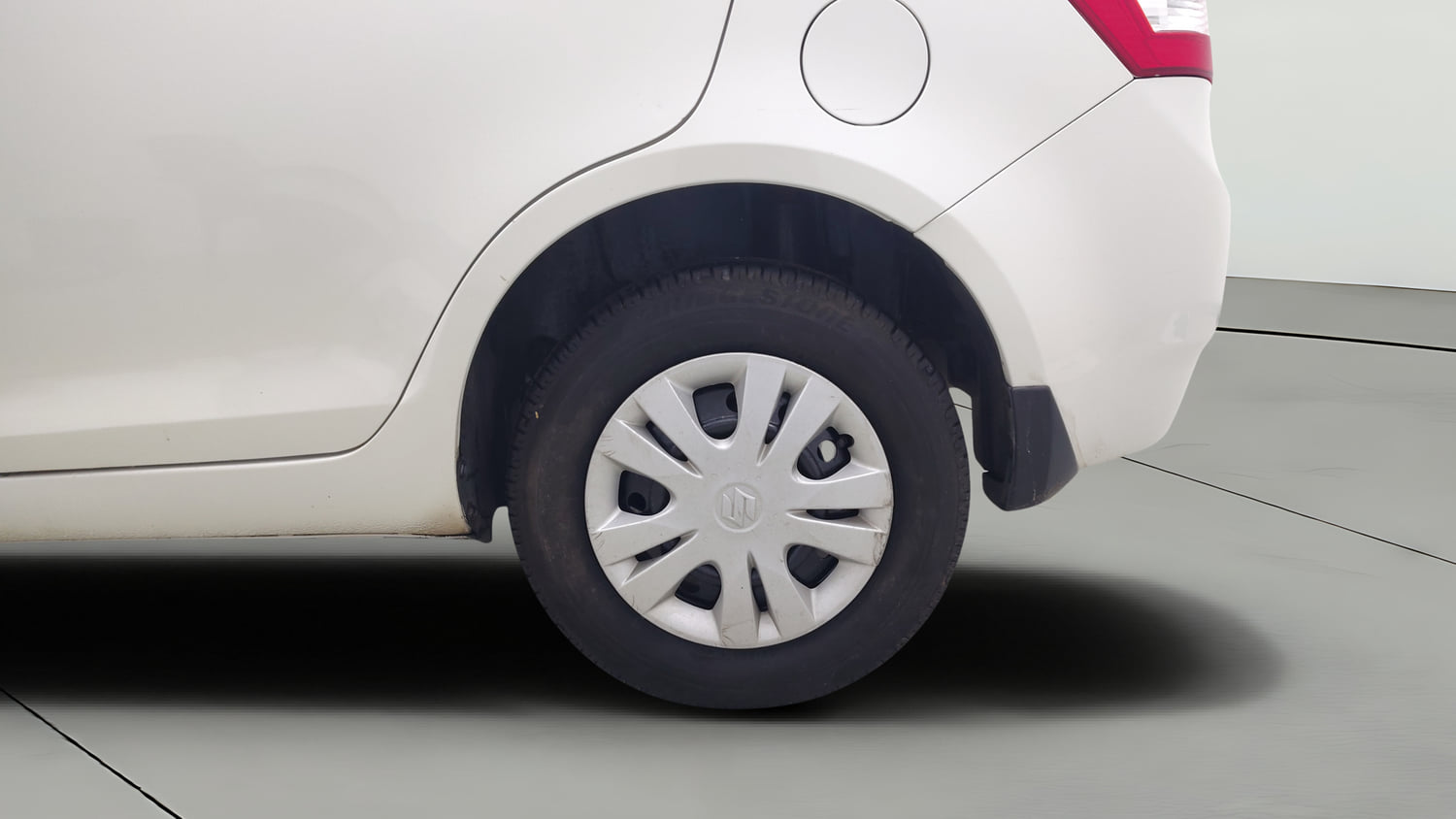 Used 2014 Maruti Suzuki Swift Dzire VXI Petrol Manual tyres LEFT REAR TYRE RIM VIEW