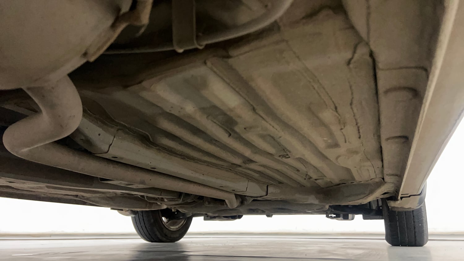 Used 2023 Honda Amaze VX MT 1.2 Petrol Petrol Manual extra REAR RIGHT UNDERBODY VIEW