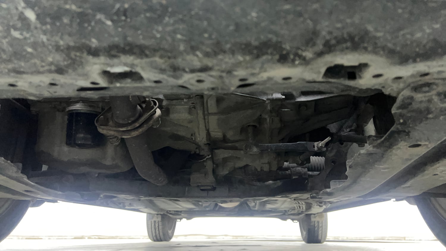 Used 2017 Maruti Suzuki Baleno Zeta 1.2 Petrol Manual extra FRONT LEFT UNDERBODY VIEW