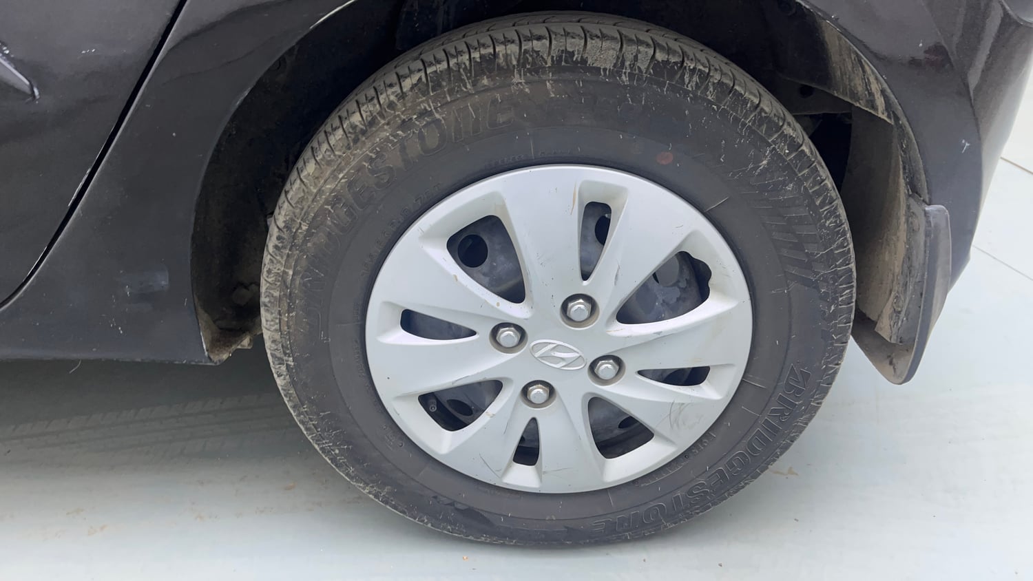 Used 2012 Hyundai i10 Sportz 1.2 Kappa2 Petrol Manual tyres LEFT REAR TYRE RIM VIEW
