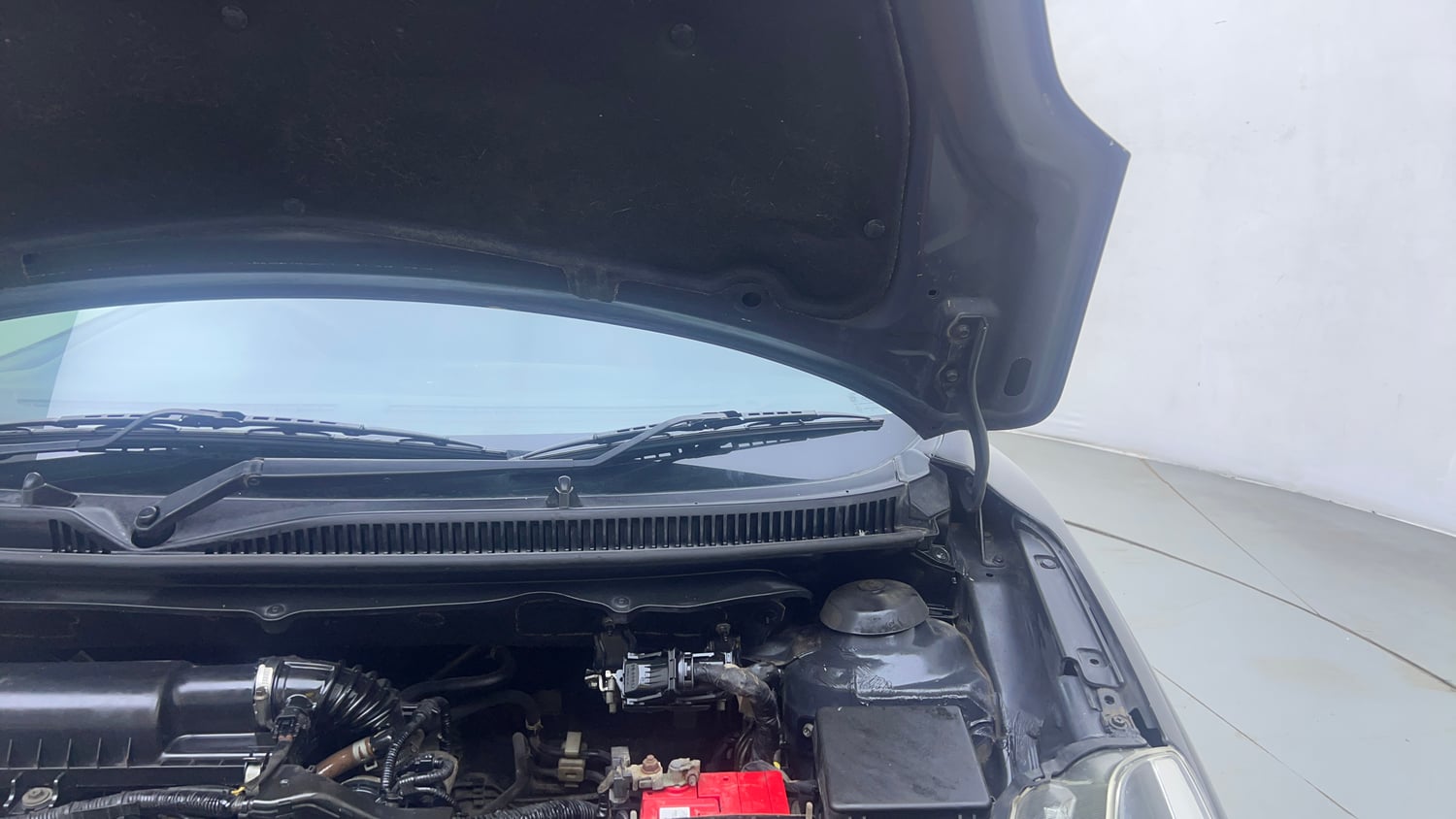 Used 2019 Maruti Suzuki Baleno Alpha 1.2 Petrol Manual engine ENGINE LEFT SIDE HINGE & APRON VIEW