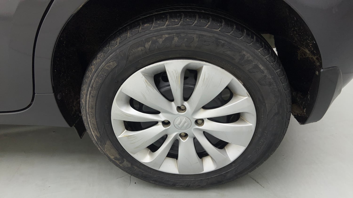 Used 2018 Maruti Suzuki Baleno Delta 1.2 Petrol Manual tyres LEFT REAR TYRE RIM VIEW
