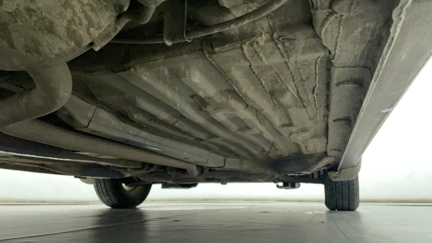 Used 2019 Honda Amaze 1.2 VX MT Petrol Petrol Manual extra REAR RIGHT UNDERBODY VIEW