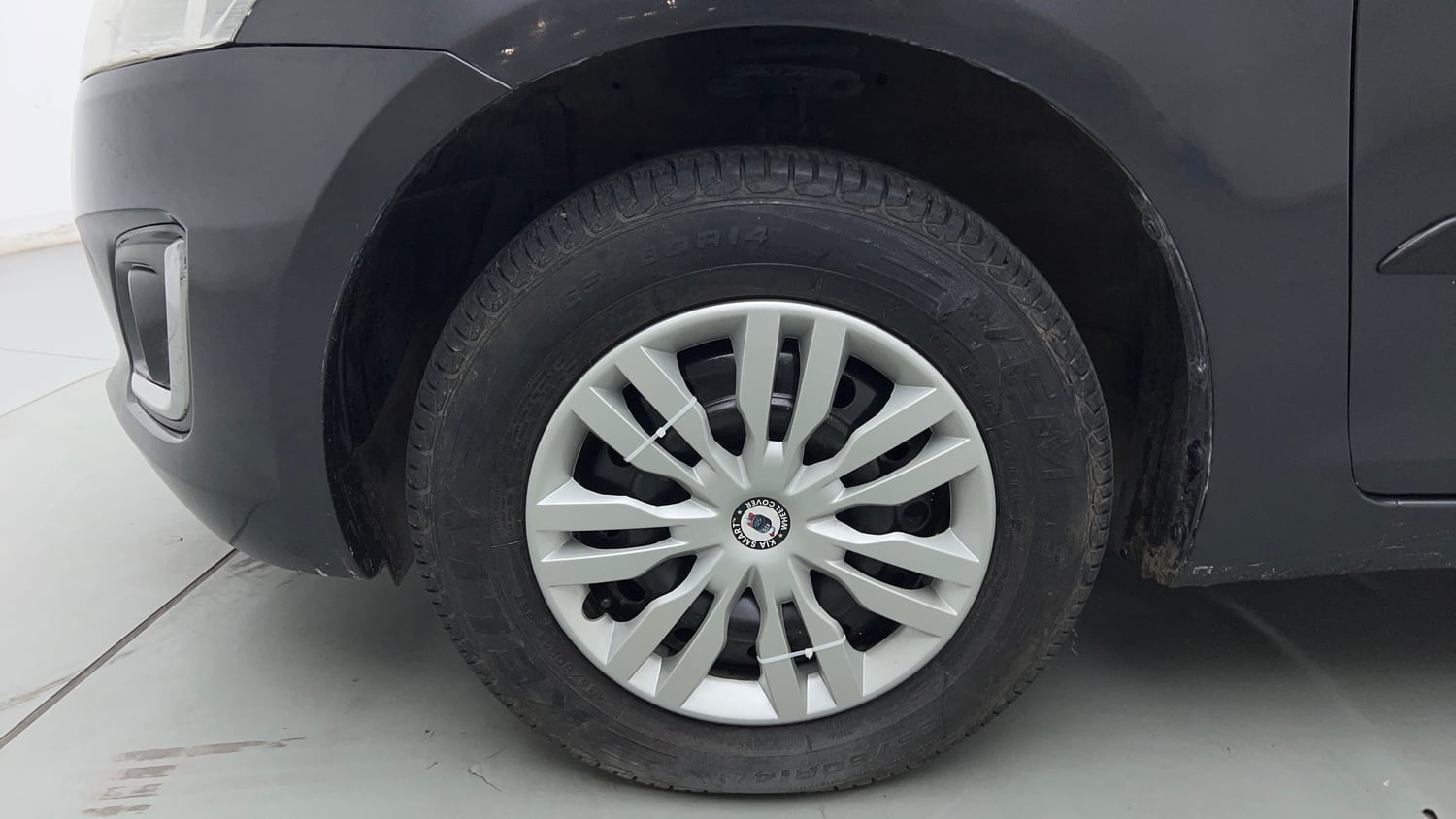 Used 2016 Maruti Suzuki Swift VXi Petrol Manual tyres LEFT FRONT TYRE RIM VIEW
