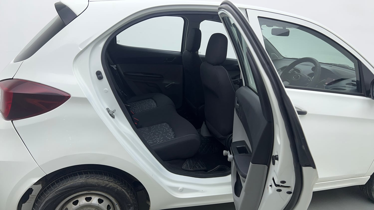 Used 2025 Tata Tiago XE Petrol Manual interior RIGHT SIDE REAR DOOR CABIN VIEW