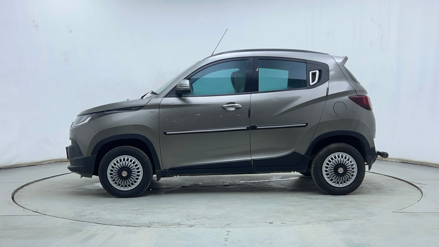Used 2016 Mahindra KUV100 K6+ 6 STR Petrol Manual exterior LEFT SIDE VIEW