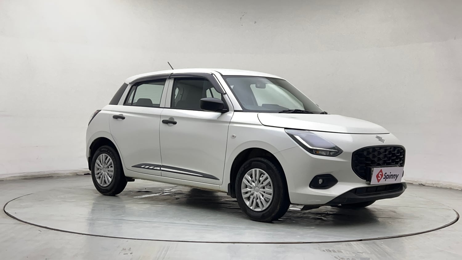 Used 2026 Maruti Suzuki Swift LXi Petrol Manual exterior RIGHT FRONT CORNER VIEW