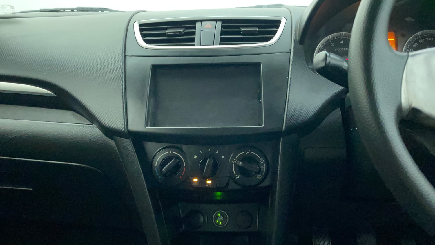 Used 2014 Maruti Suzuki Swift VXI CNG (Outside Fitted) Cng Manual interior MUSIC SYSTEM & AC CONTROL VIEW