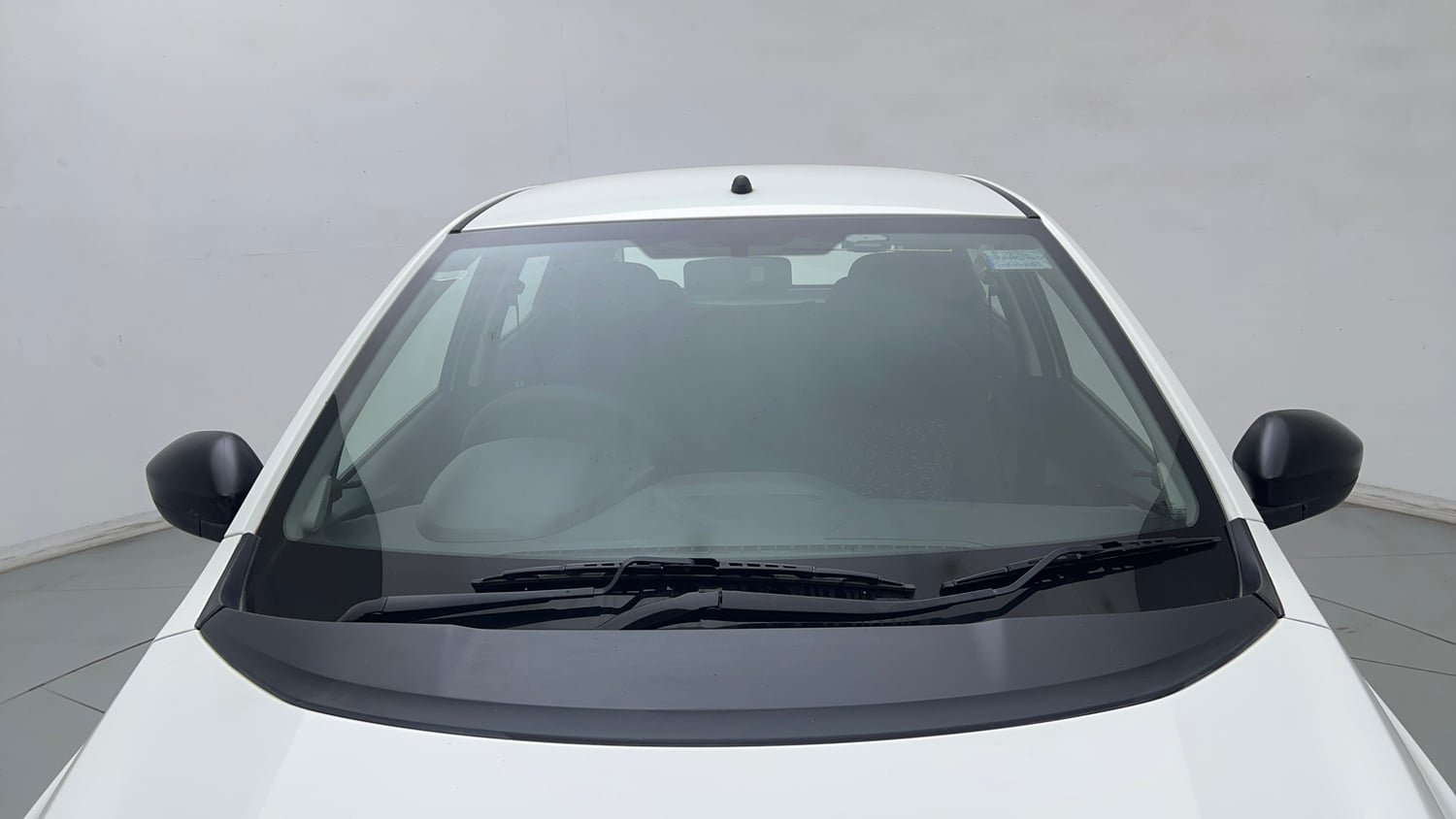 Used 2025 Tata Tiago XE Petrol Manual exterior FRONT WINDSHIELD VIEW