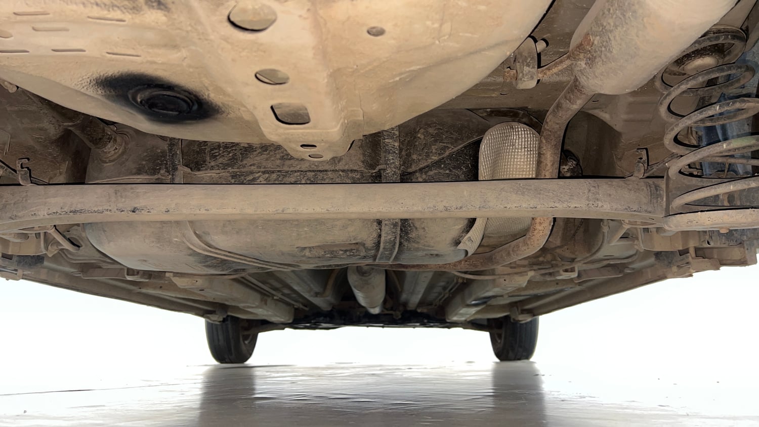Used 2017 Maruti Suzuki Swift Lxi (O) Petrol Manual extra REAR UNDERBODY VIEW (TAKEN FROM REAR)