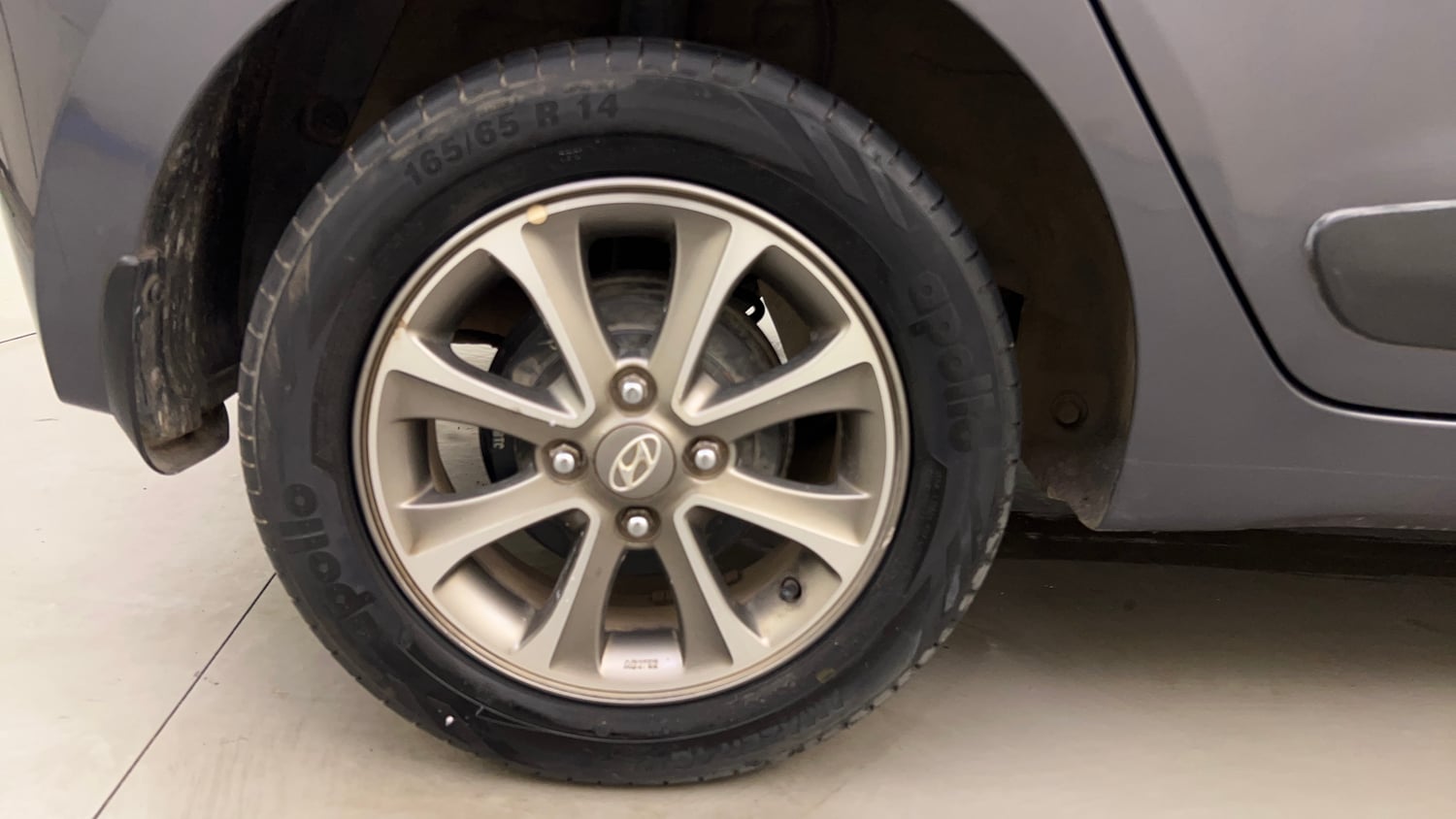 Used 2015 Hyundai Grand i10 Asta 1.2 Kappa VTVT Petrol Manual tyres RIGHT REAR TYRE RIM VIEW
