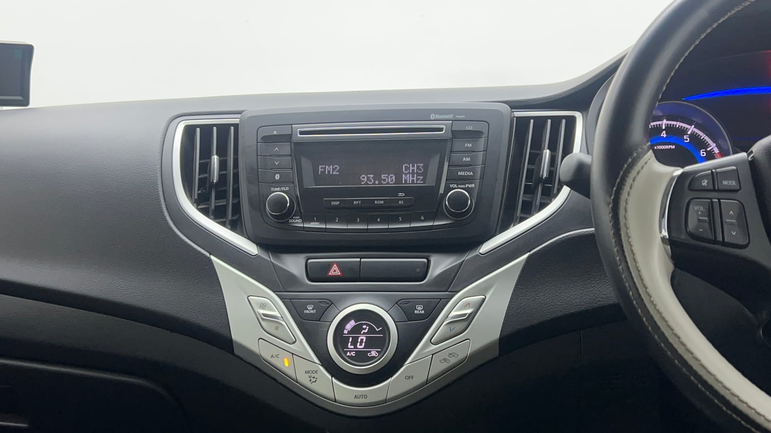 Used 2018 Maruti Suzuki Baleno Delta 1.2 Petrol Manual interior MUSIC SYSTEM & AC CONTROL VIEW