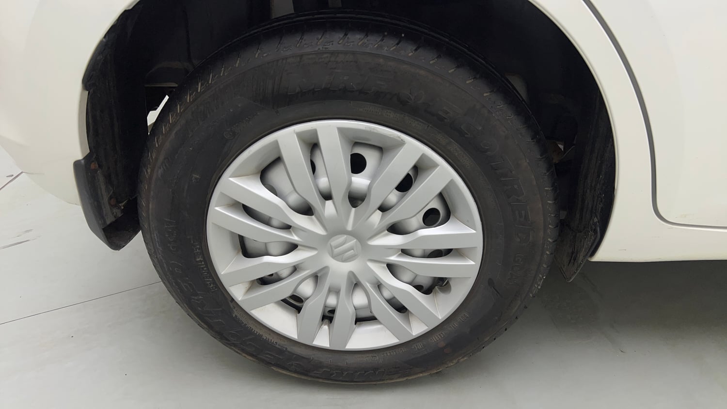 Used 2026 Maruti Suzuki Swift LXi Petrol Manual tyres RIGHT REAR TYRE RIM VIEW