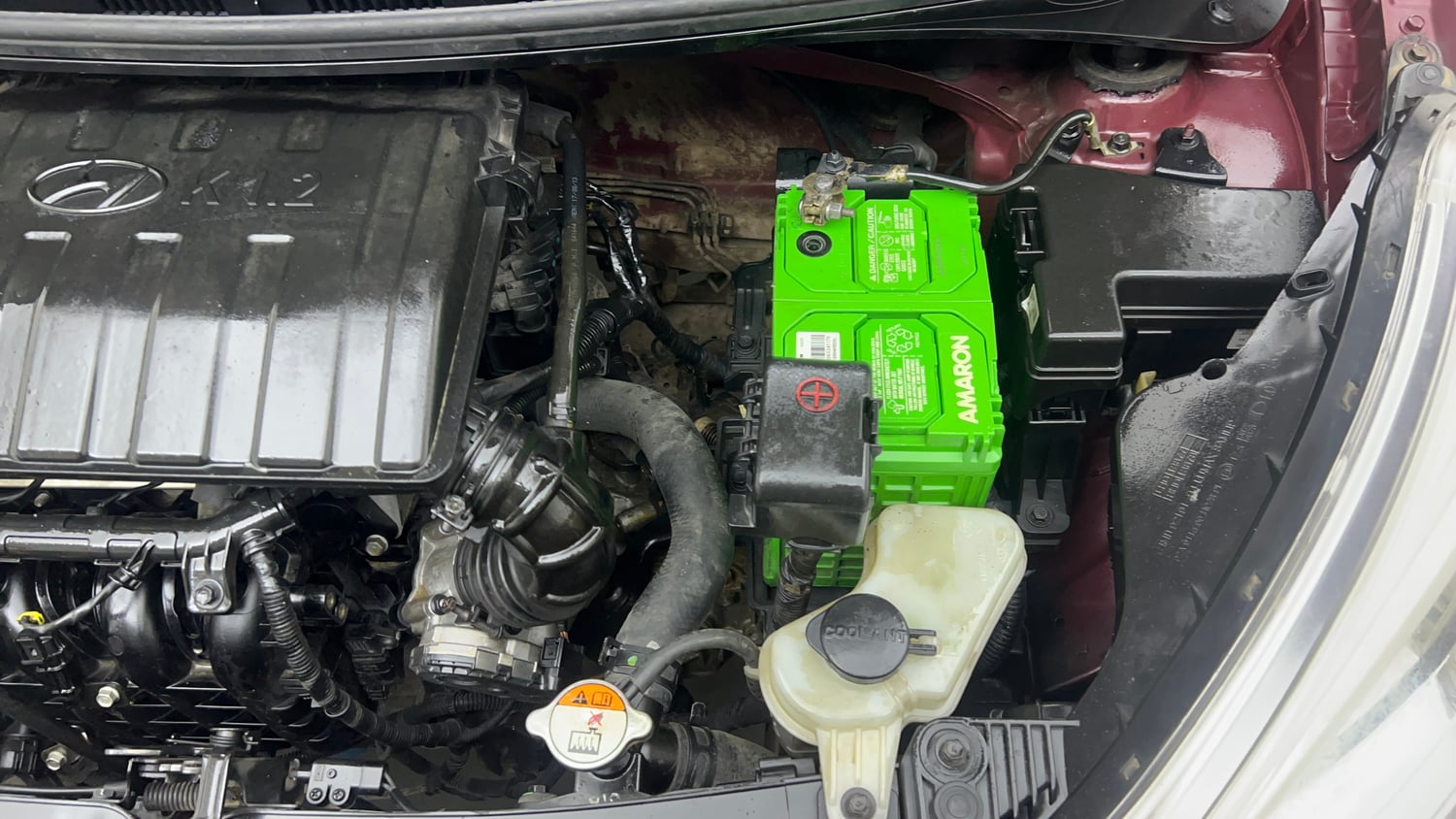 Used 2013 Hyundai Grand i10 Sportz 1.2 Kappa VTVT Petrol Manual engine ENGINE LEFT SIDE VIEW