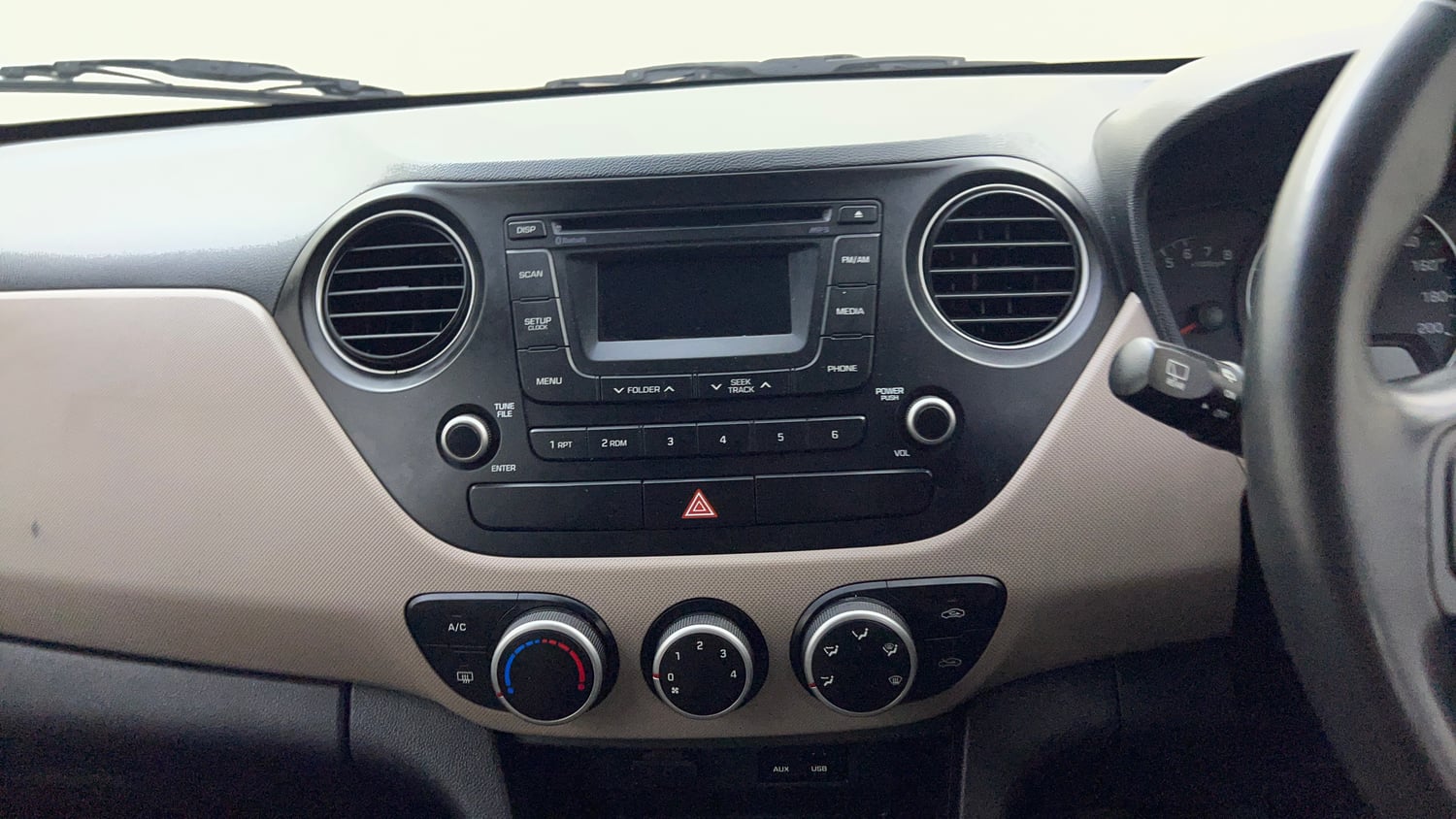 Used 2015 Hyundai Grand i10 Asta 1.2 Kappa VTVT Petrol Manual top_features Integrated (in-dash) music system