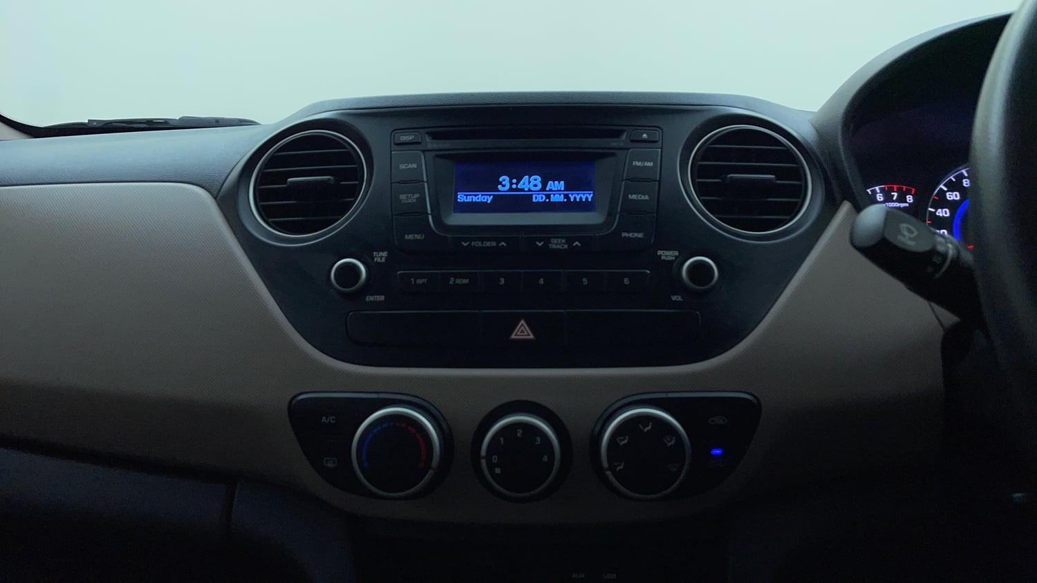 Used 2015 Hyundai Grand i10 Sportz 1.2 Kappa VTVT Petrol Manual interior MUSIC SYSTEM & AC CONTROL VIEW