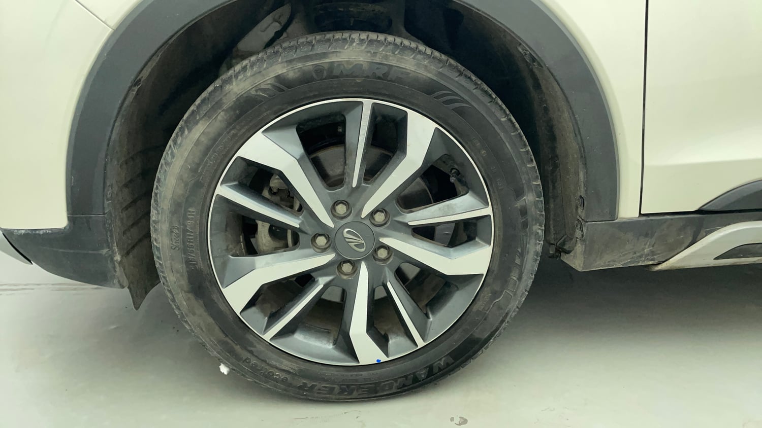Used 2021 Mahindra XUV 300 W8 (O) 1.2 Petrol Petrol Manual tyres LEFT FRONT TYRE RIM VIEW