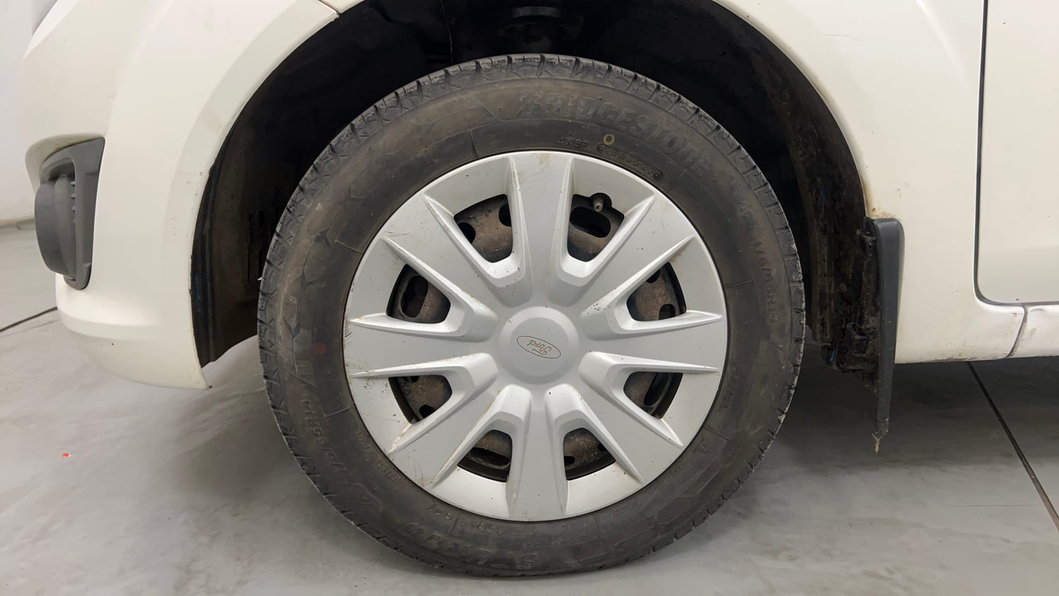 Used 2013 Ford Figo Duratorq Diesel ZXI 1.4 Diesel Manual tyres LEFT FRONT TYRE RIM VIEW