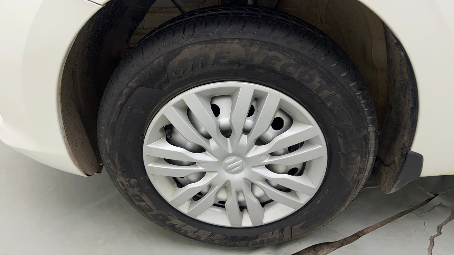 Used 2026 Maruti Suzuki Swift LXi Petrol Manual tyres LEFT FRONT TYRE RIM VIEW