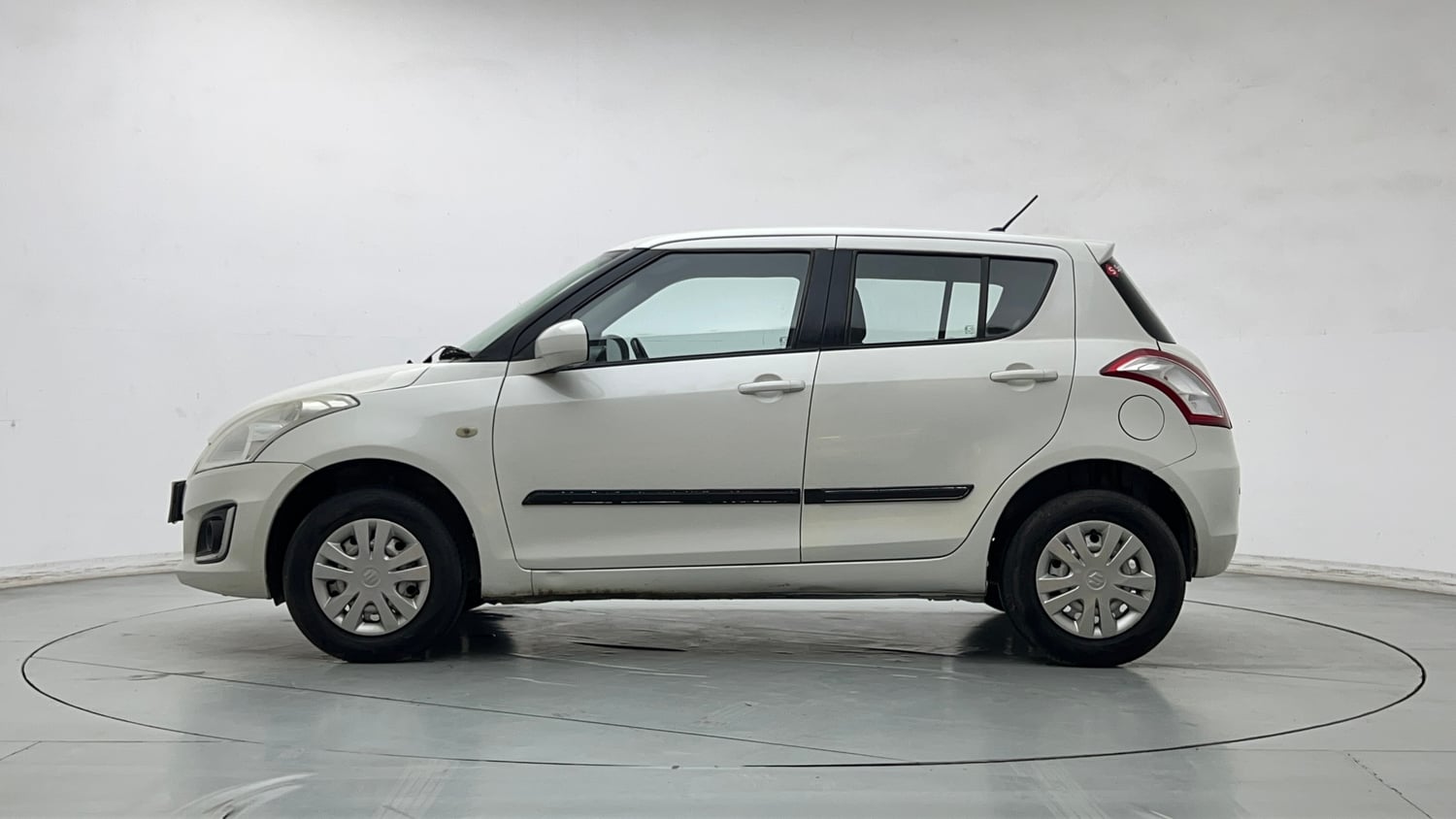 Used 2017 Maruti Suzuki Swift Lxi (O) Petrol Manual exterior LEFT SIDE VIEW