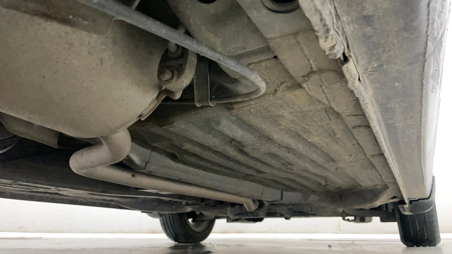 Used 2023 Honda Amaze VX MT 1.2 Petrol Petrol Manual extra REAR RIGHT UNDERBODY VIEW
