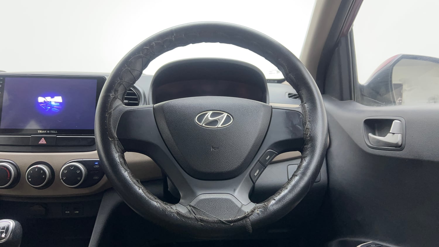 Used 2013 Hyundai Grand i10 Sportz 1.2 Kappa VTVT Petrol Manual interior STEERING VIEW