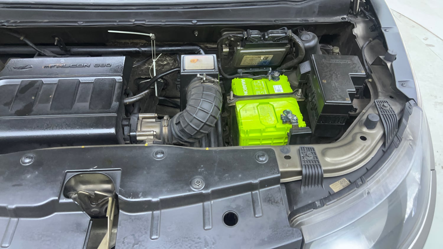 Used 2016 Mahindra KUV100 K6+ 6 STR Petrol Manual engine ENGINE LEFT SIDE VIEW