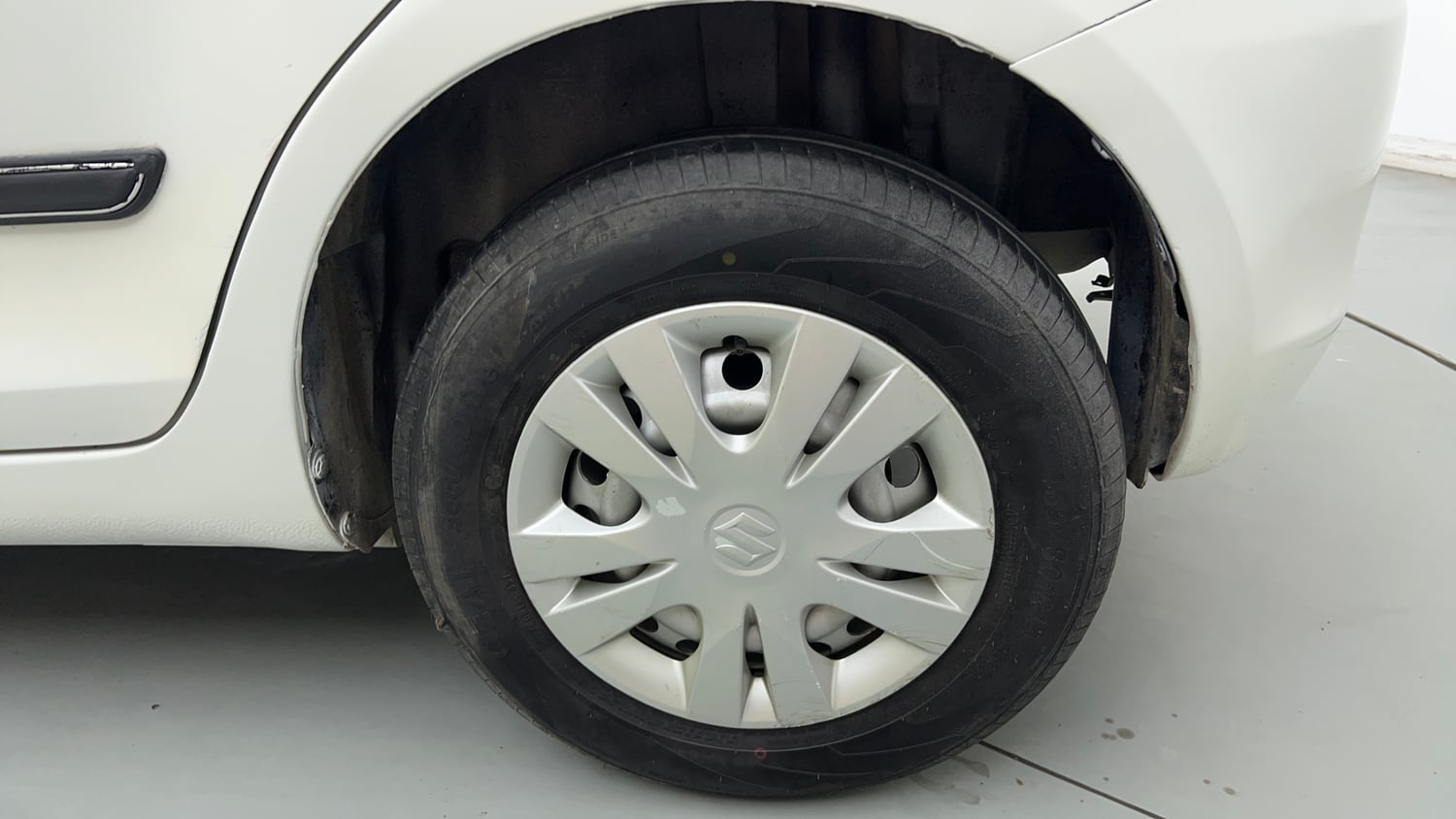 Used 2017 Maruti Suzuki Swift Lxi (O) Petrol Manual tyres LEFT REAR TYRE RIM VIEW