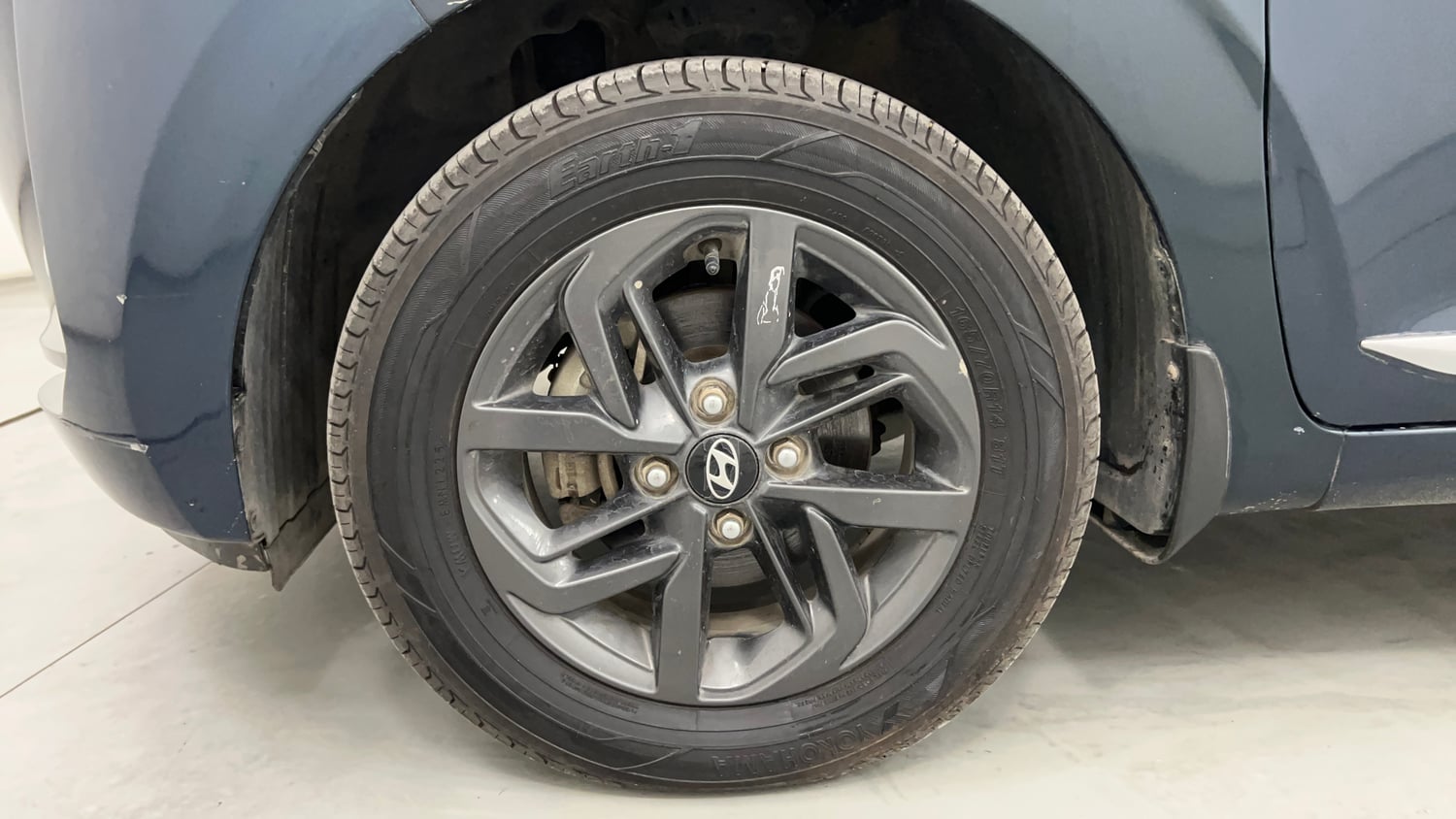 Used 2021 Hyundai Grand i10 Nios Sportz AMT 1.2 Kappa VTVT Petrol Automatic tyres LEFT FRONT TYRE RIM VIEW