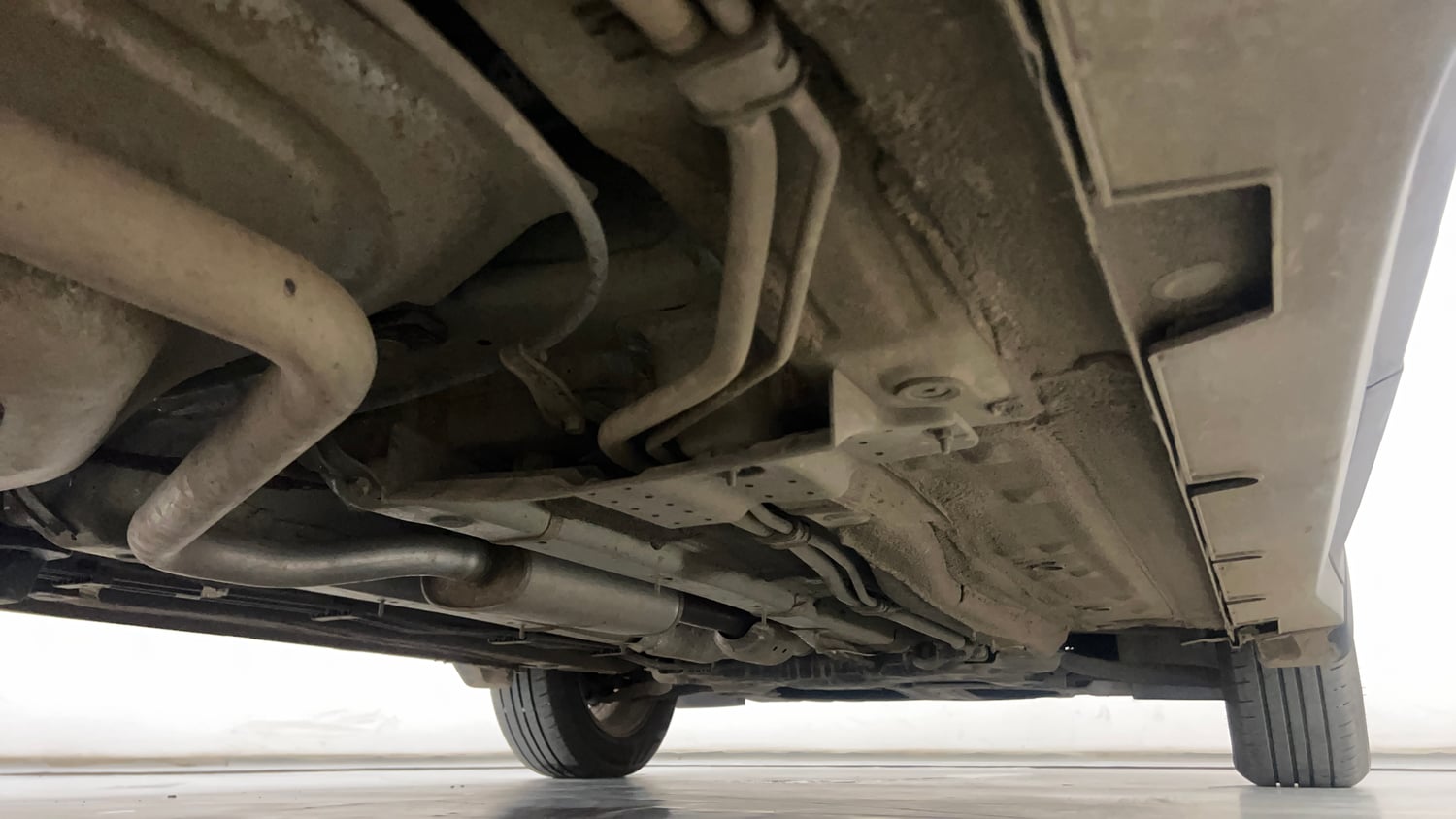 Used 2026 Kia Carens Premium (O) 1.5 Petrol 7 STR Petrol Manual extra REAR RIGHT UNDERBODY VIEW