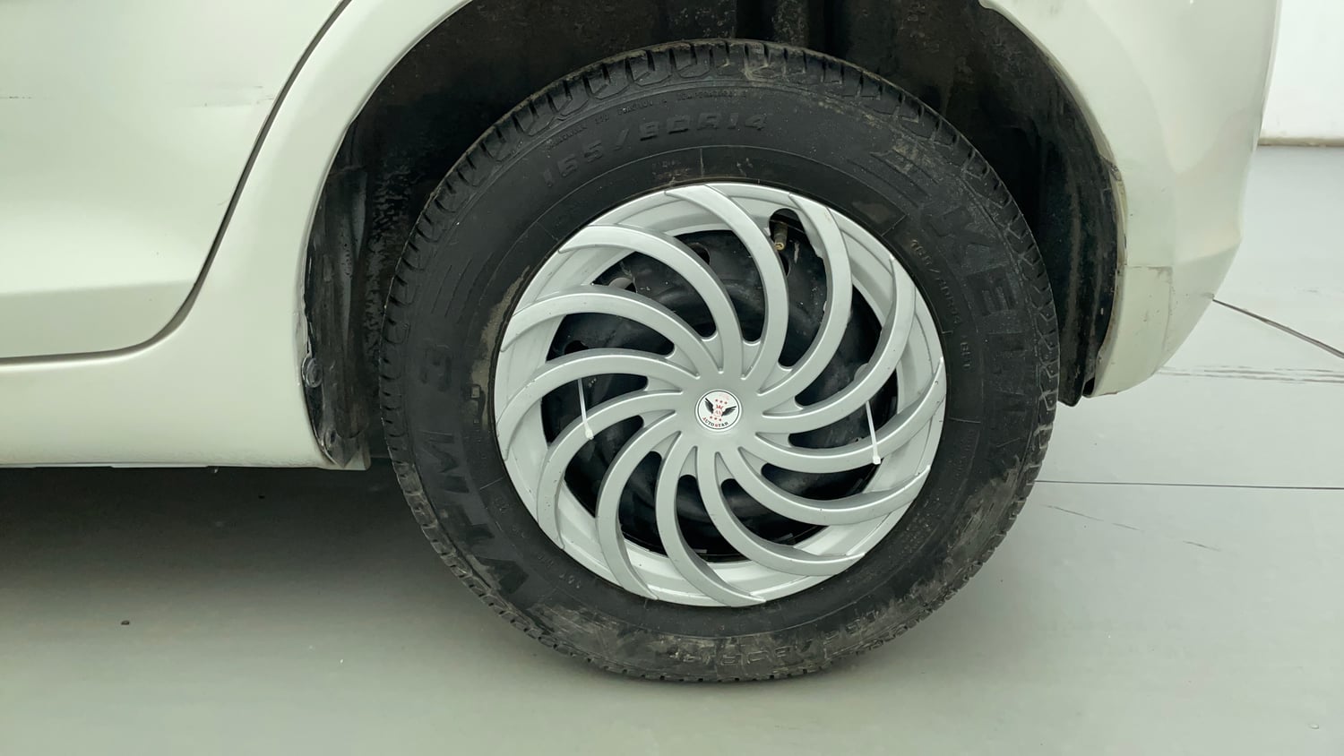 Used 2014 Maruti Suzuki Swift VXI CNG (Outside Fitted) Cng Manual tyres LEFT REAR TYRE RIM VIEW