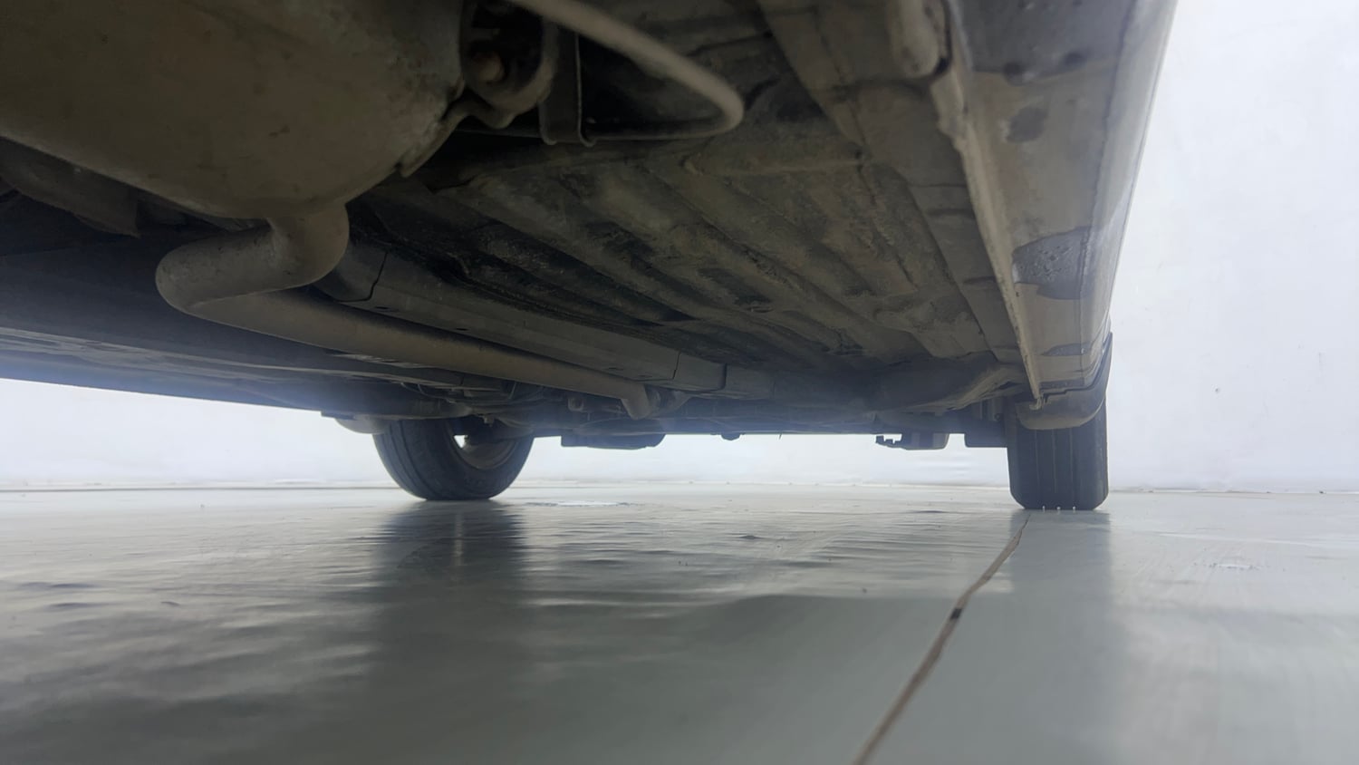 Used 2023 Honda Amaze VX CVT 1.2 Petrol Petrol Automatic extra REAR RIGHT UNDERBODY VIEW