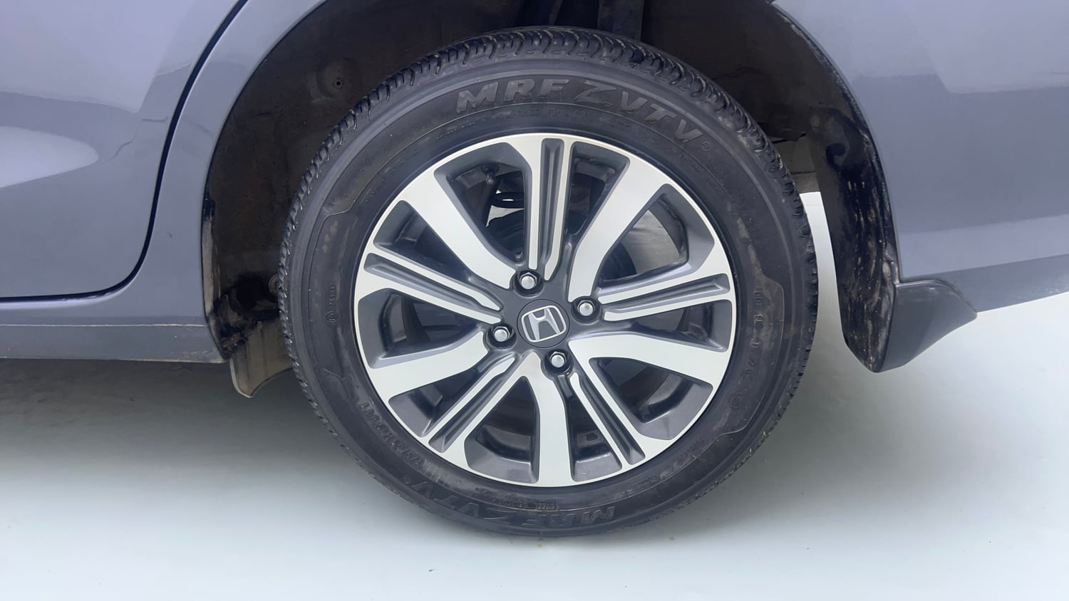 Used 2023 Honda Amaze VX CVT 1.2 Petrol Petrol Automatic tyres LEFT REAR TYRE RIM VIEW