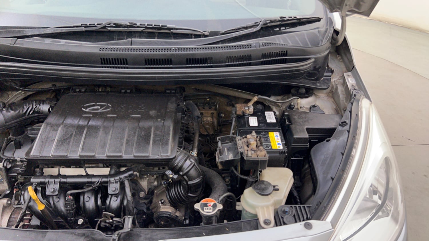 Used 2019 Hyundai Grand i10 Asta 1.2 Kappa VTVT Petrol Manual engine ENGINE LEFT SIDE HINGE & APRON VIEW