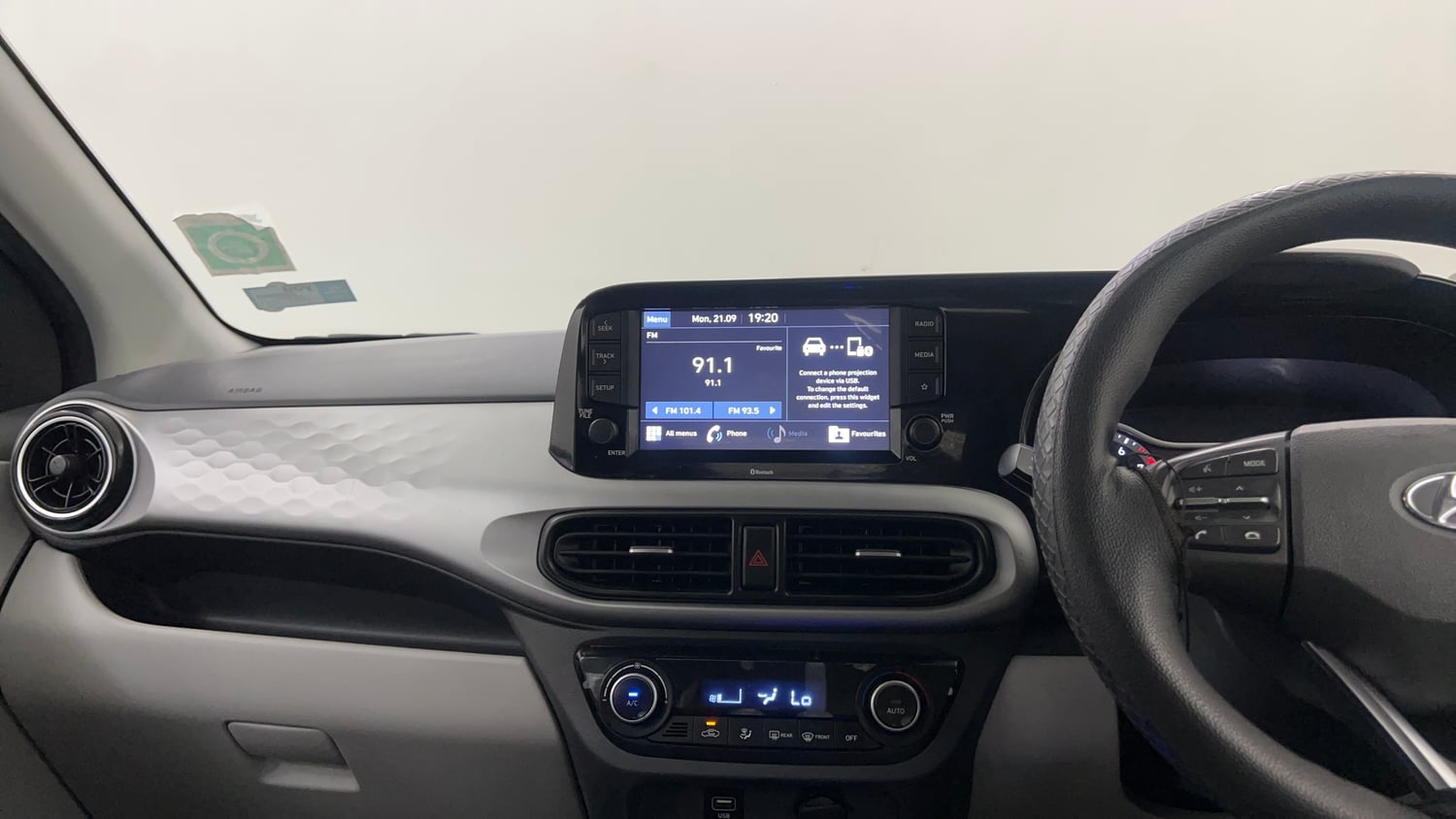 Used 2021 Hyundai Grand i10 Nios Sportz AMT 1.2 Kappa VTVT Petrol Automatic interior MUSIC SYSTEM & AC CONTROL VIEW