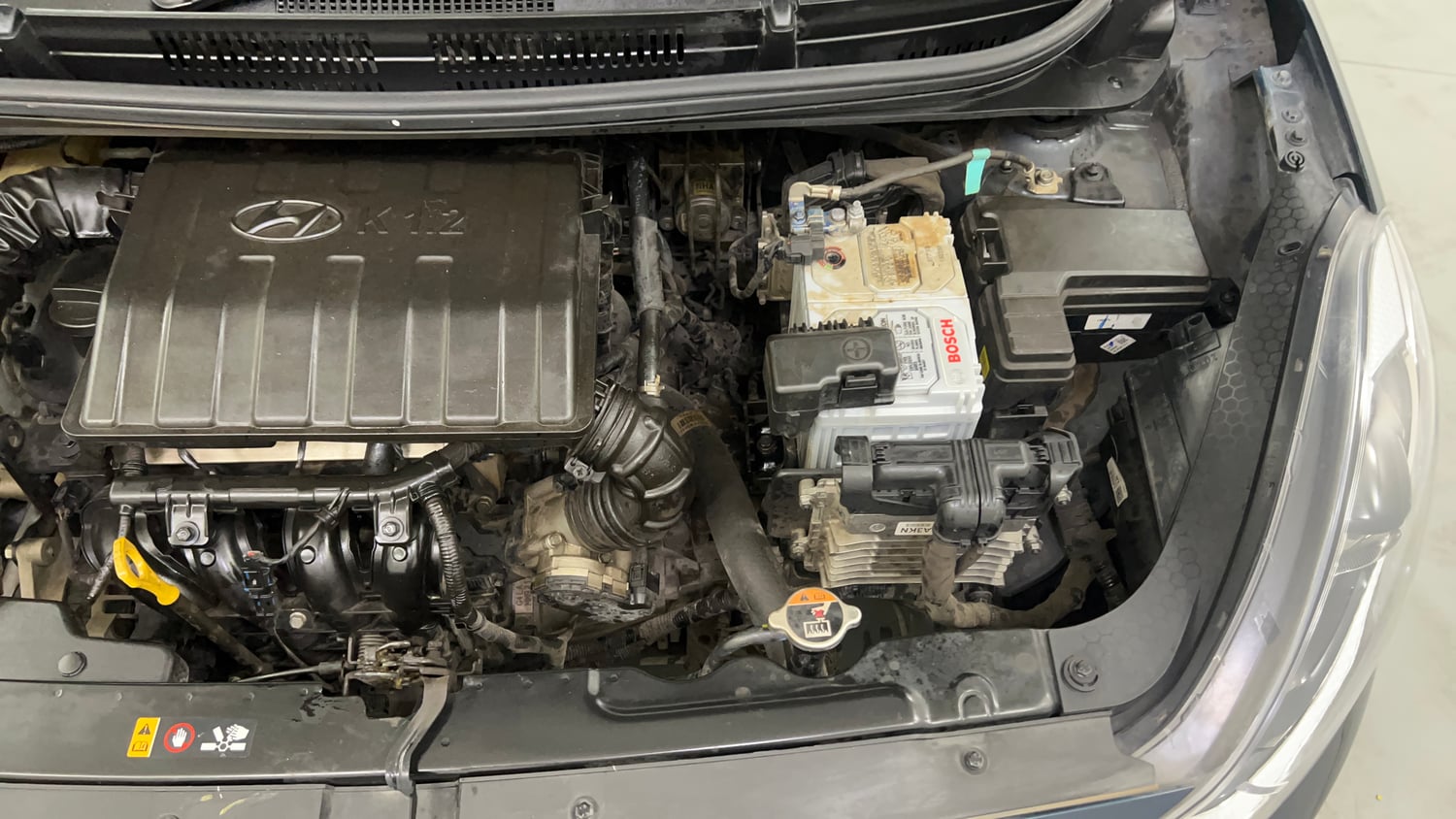 Used 2021 Hyundai Grand i10 Nios Sportz AMT 1.2 Kappa VTVT Petrol Automatic engine ENGINE LEFT SIDE VIEW