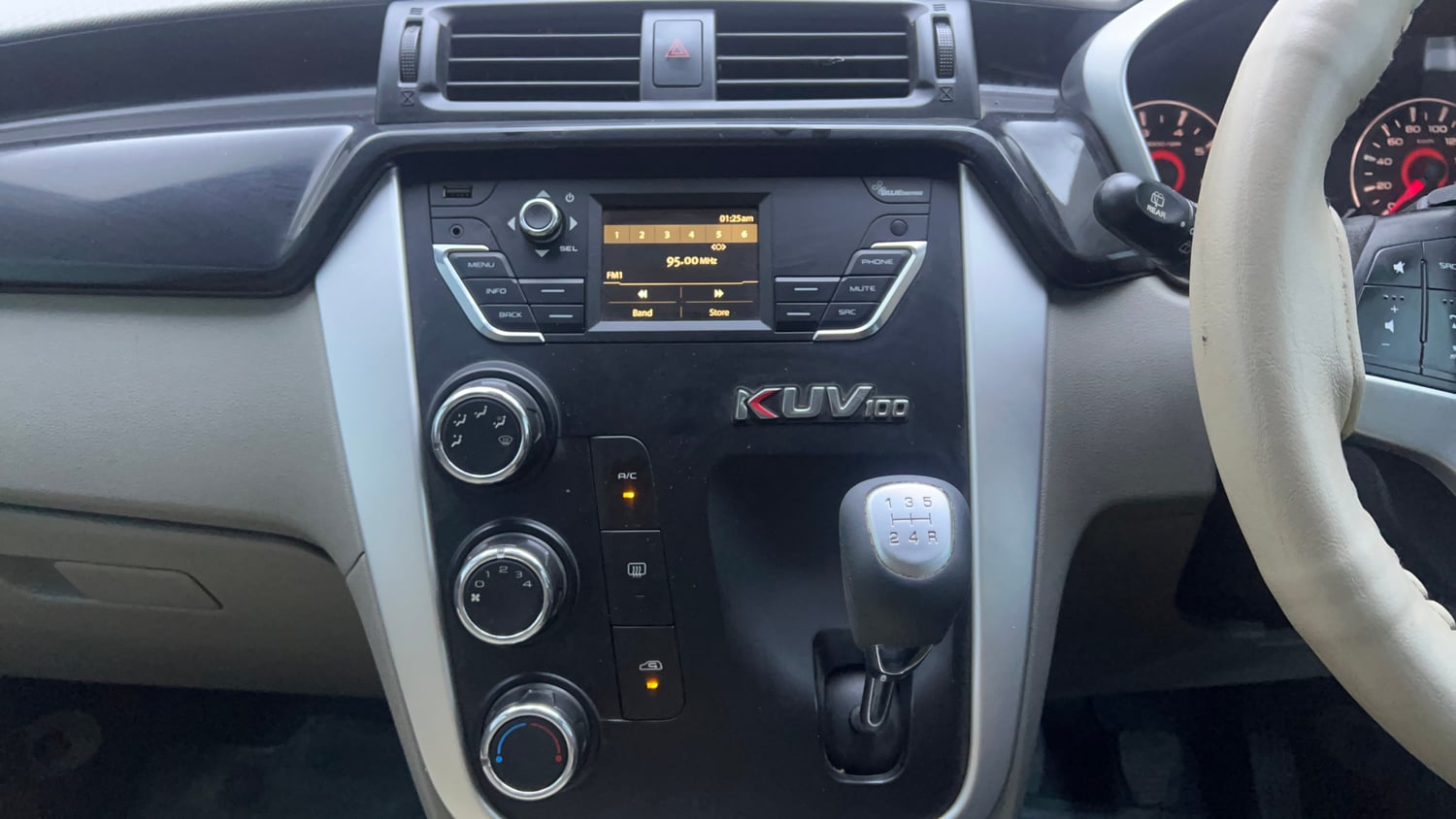 Used 2016 Mahindra KUV100 K6+ 6 STR Petrol Manual interior MUSIC SYSTEM & AC CONTROL VIEW