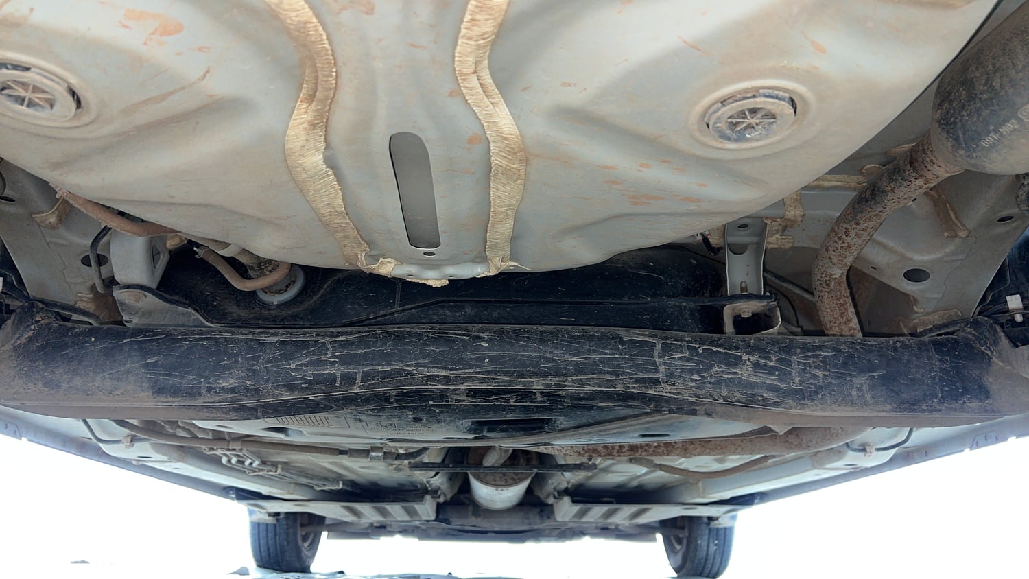 Used 2026 Maruti Suzuki Swift LXi Petrol Manual extra REAR UNDERBODY VIEW (TAKEN FROM REAR)