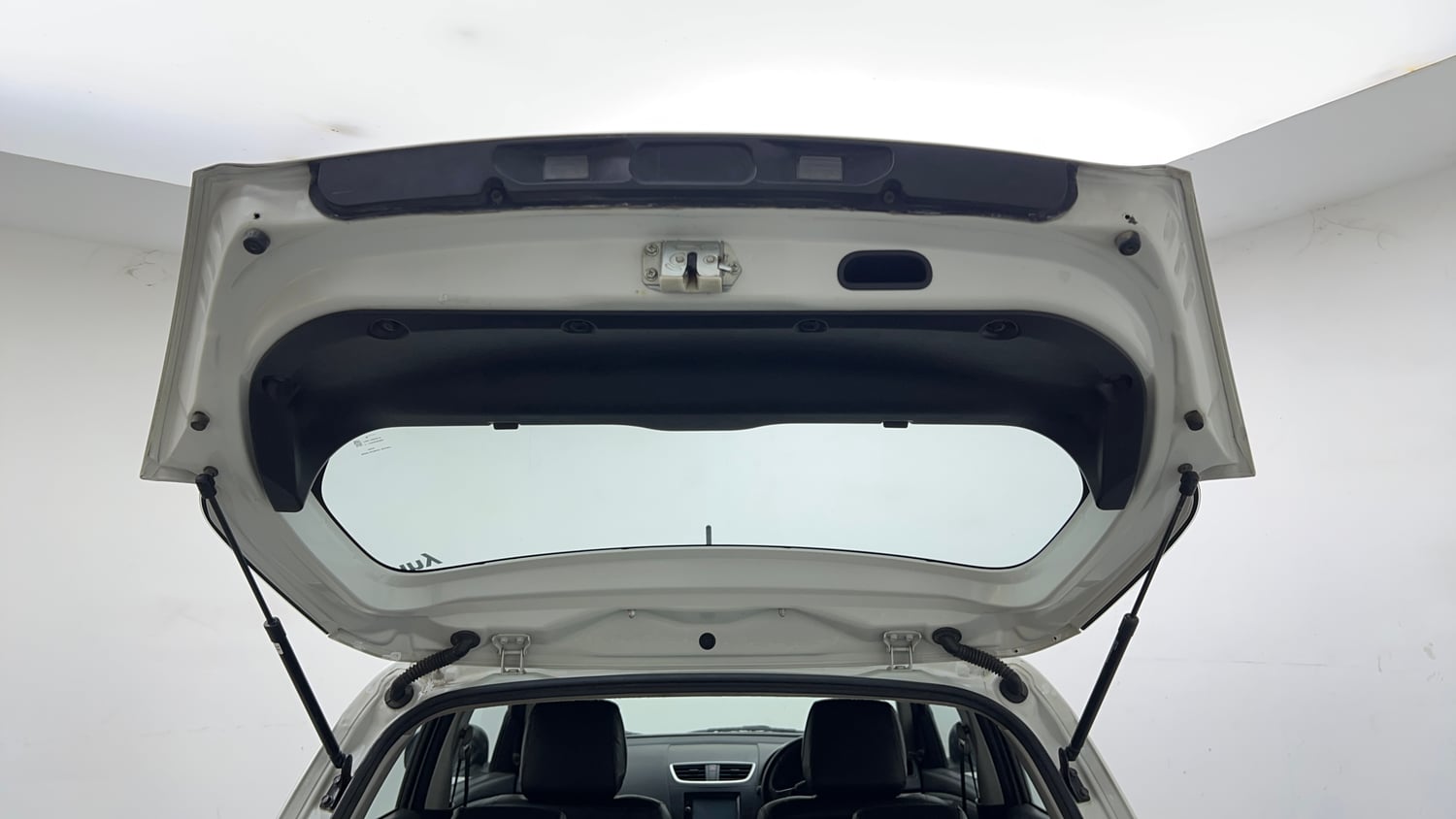 Used 2017 Maruti Suzuki Swift Lxi (O) Petrol Manual interior DICKY DOOR OPEN VIEW