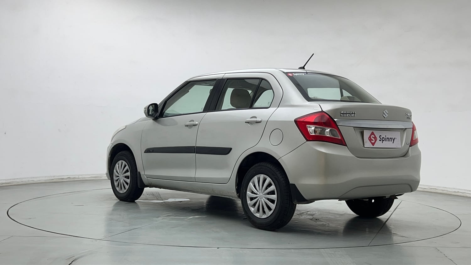 Used 2016 Maruti Suzuki Swift Dzire VXI (O) Petrol Manual exterior LEFT REAR CORNER VIEW