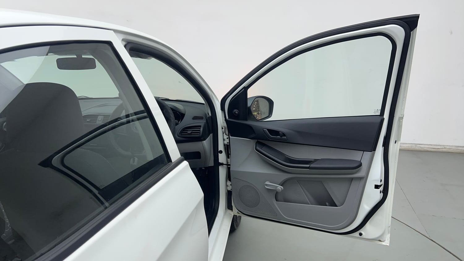 Used 2025 Tata Tiago XE Petrol Manual interior RIGHT FRONT DOOR OPEN VIEW