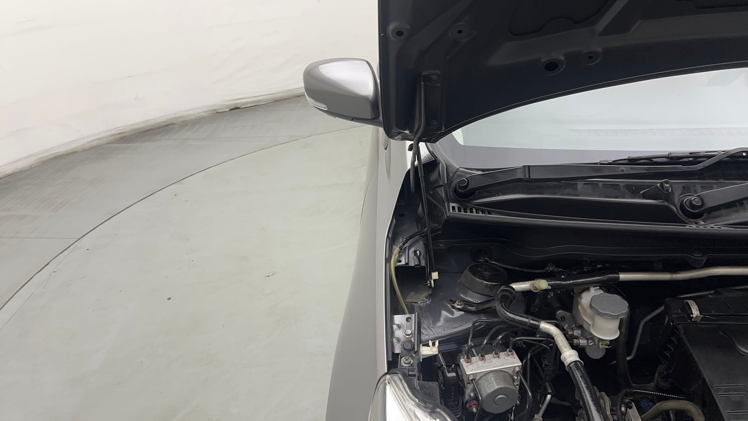Used 2018 Maruti Suzuki Celerio ZXi (O) AMT Petrol Automatic engine ENGINE RIGHT SIDE HINGE & APRON VIEW