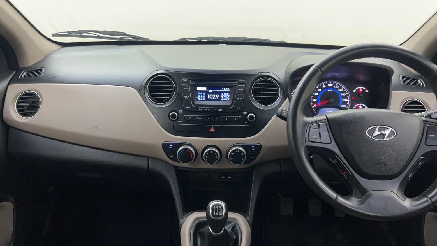 Used 2015 Hyundai Grand i10 Asta 1.2 Kappa VTVT Petrol Manual interior MUSIC SYSTEM & AC CONTROL VIEW